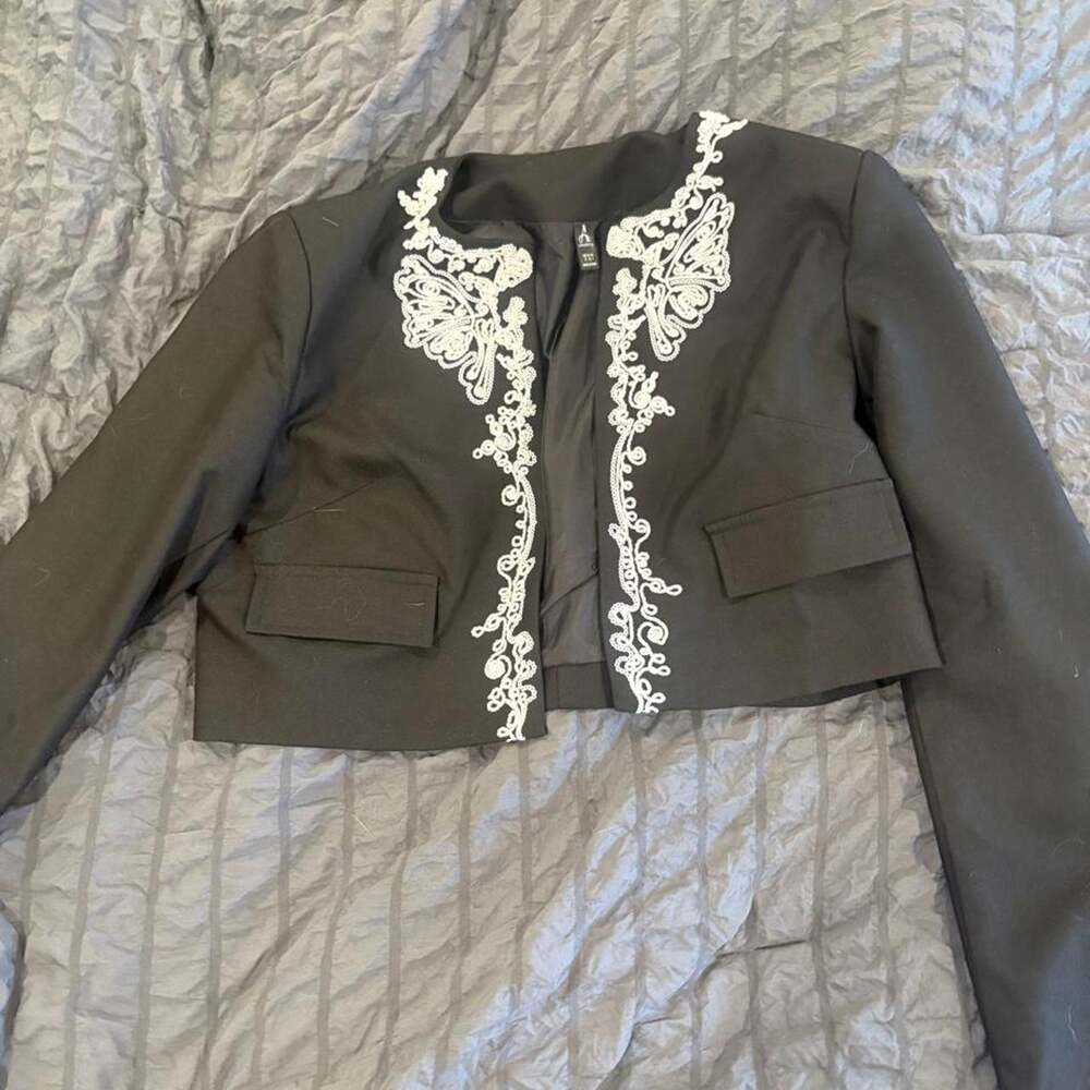 Black jacket with white floral